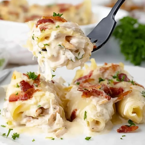 A fork is being used to eat a piece of food.