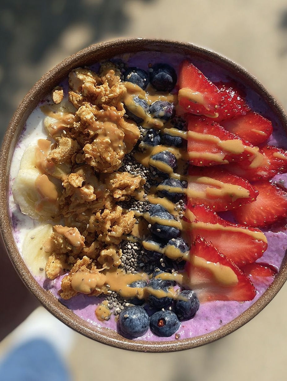 A bowl of cottage cheese with bananas, blueberries, and strawberries.