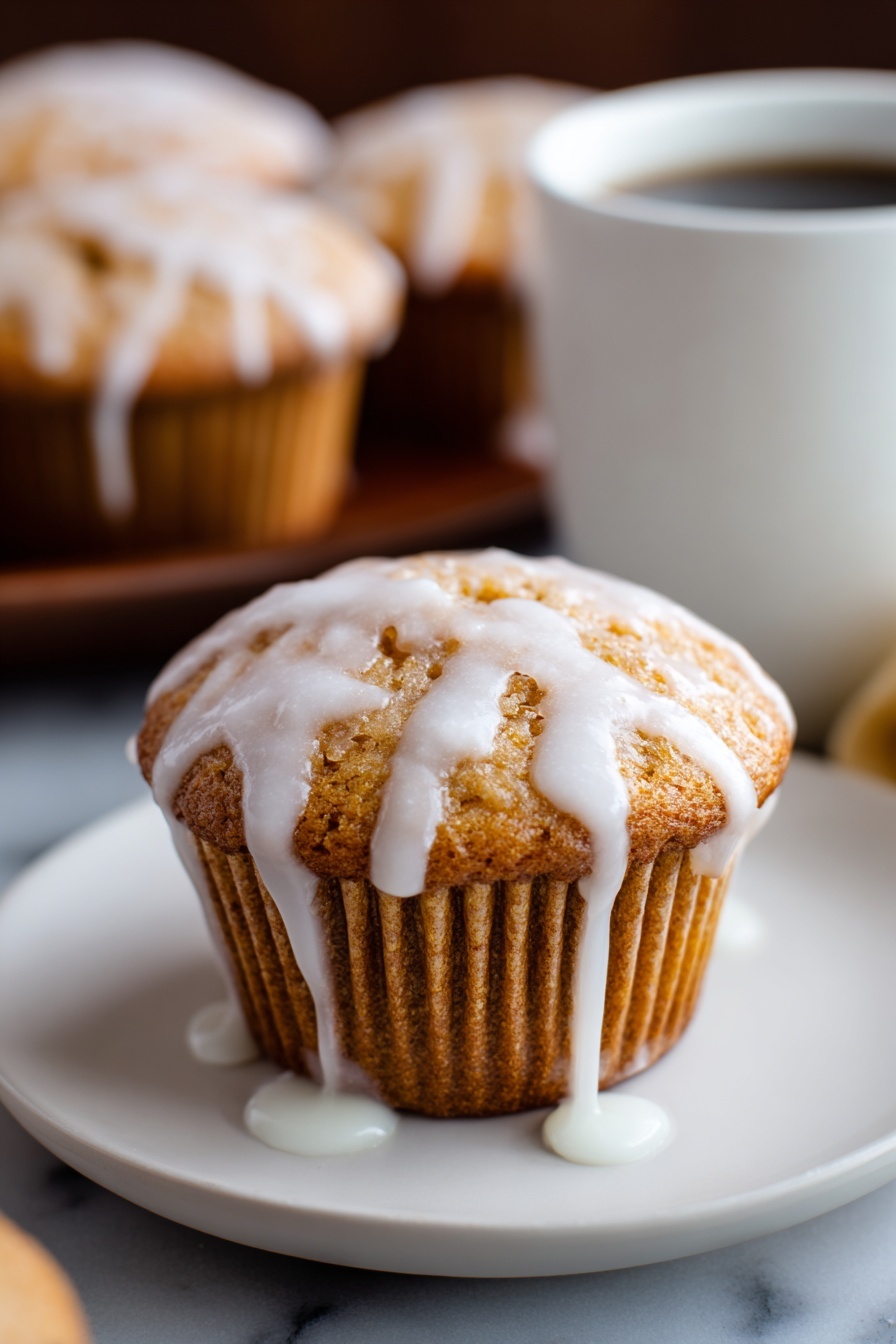 A cupcake with vanilla bean glaze.