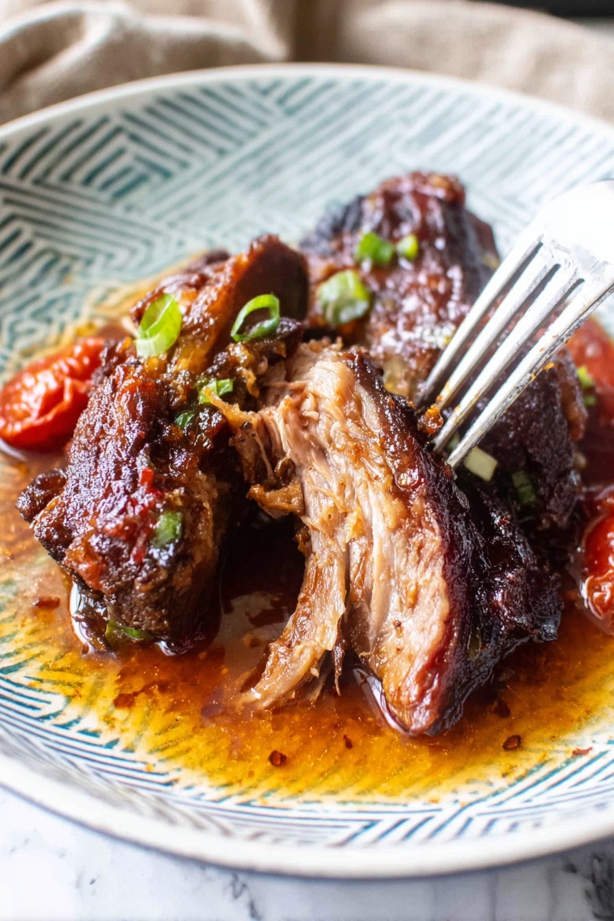 A plate of food with a fork on it.