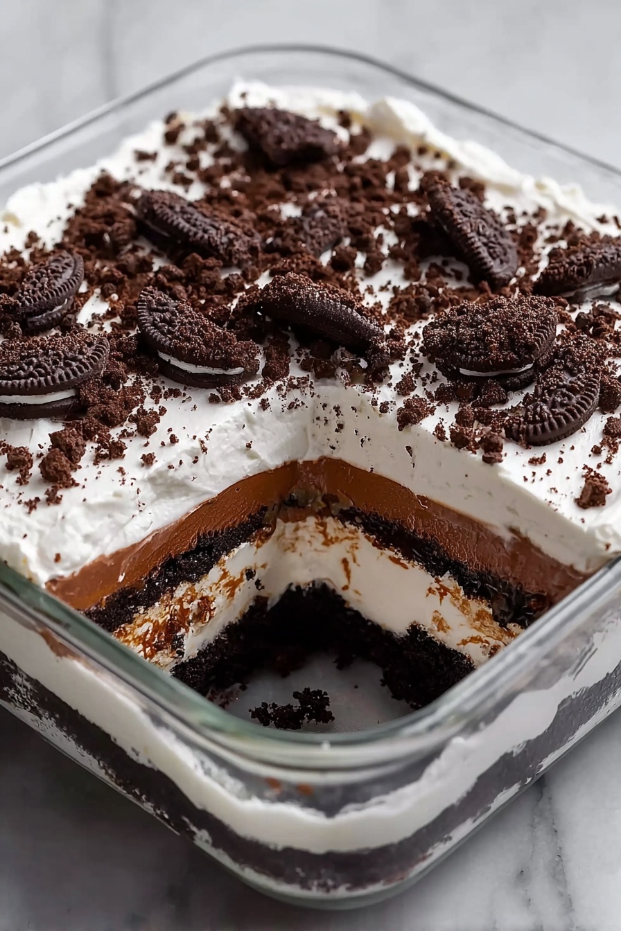 A slice of chocolate and oreo dessert.