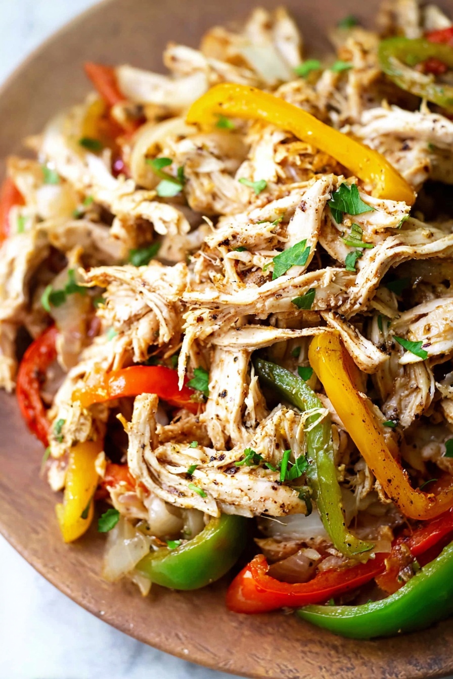 A close up of a delicious meal of chicken and peppers.