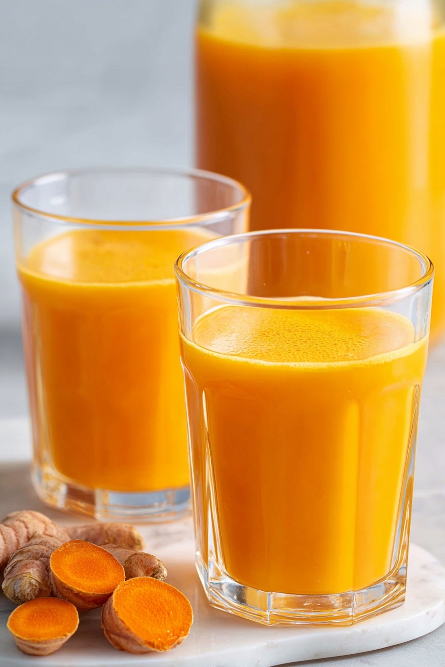 Two glasses of orange juice.