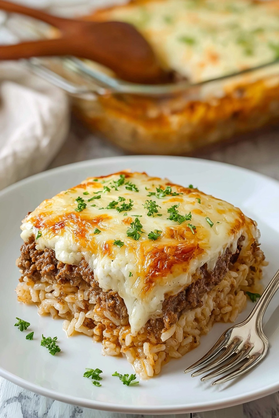 A slice of French Onion Ground Beef Rice Casserole.