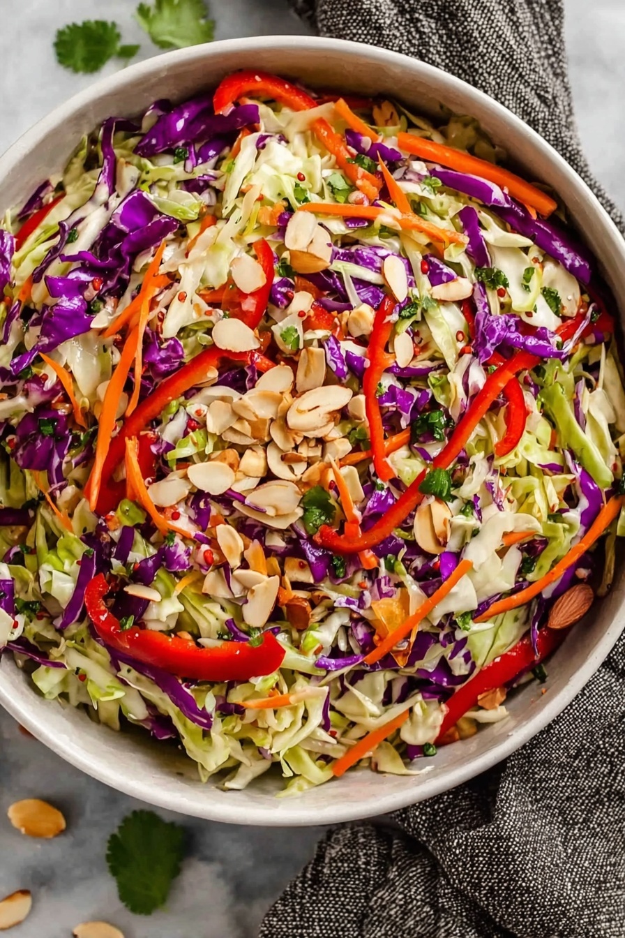 A bowl of salad with various vegetables.