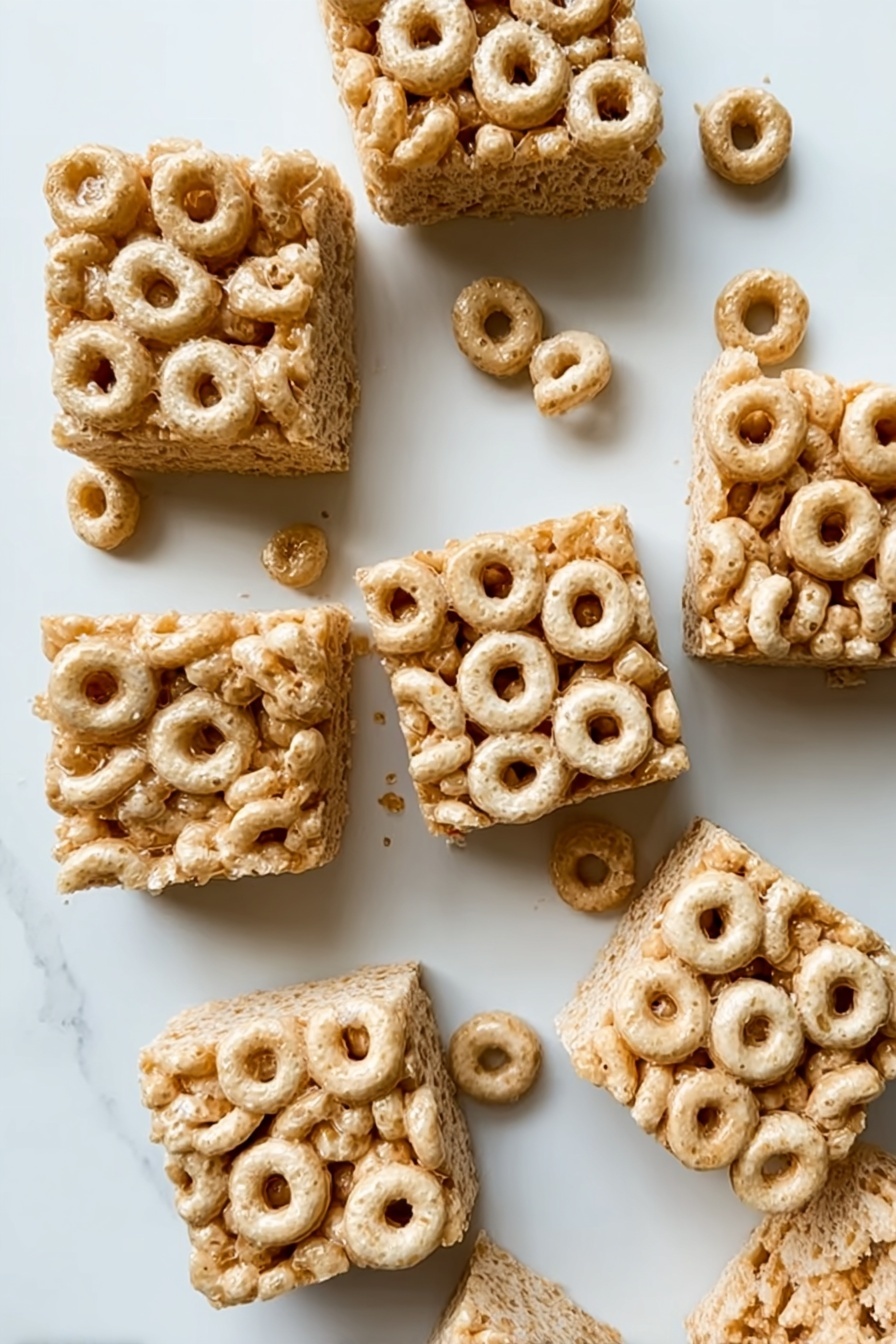 A close up of a peanut butter and cheerio bar.