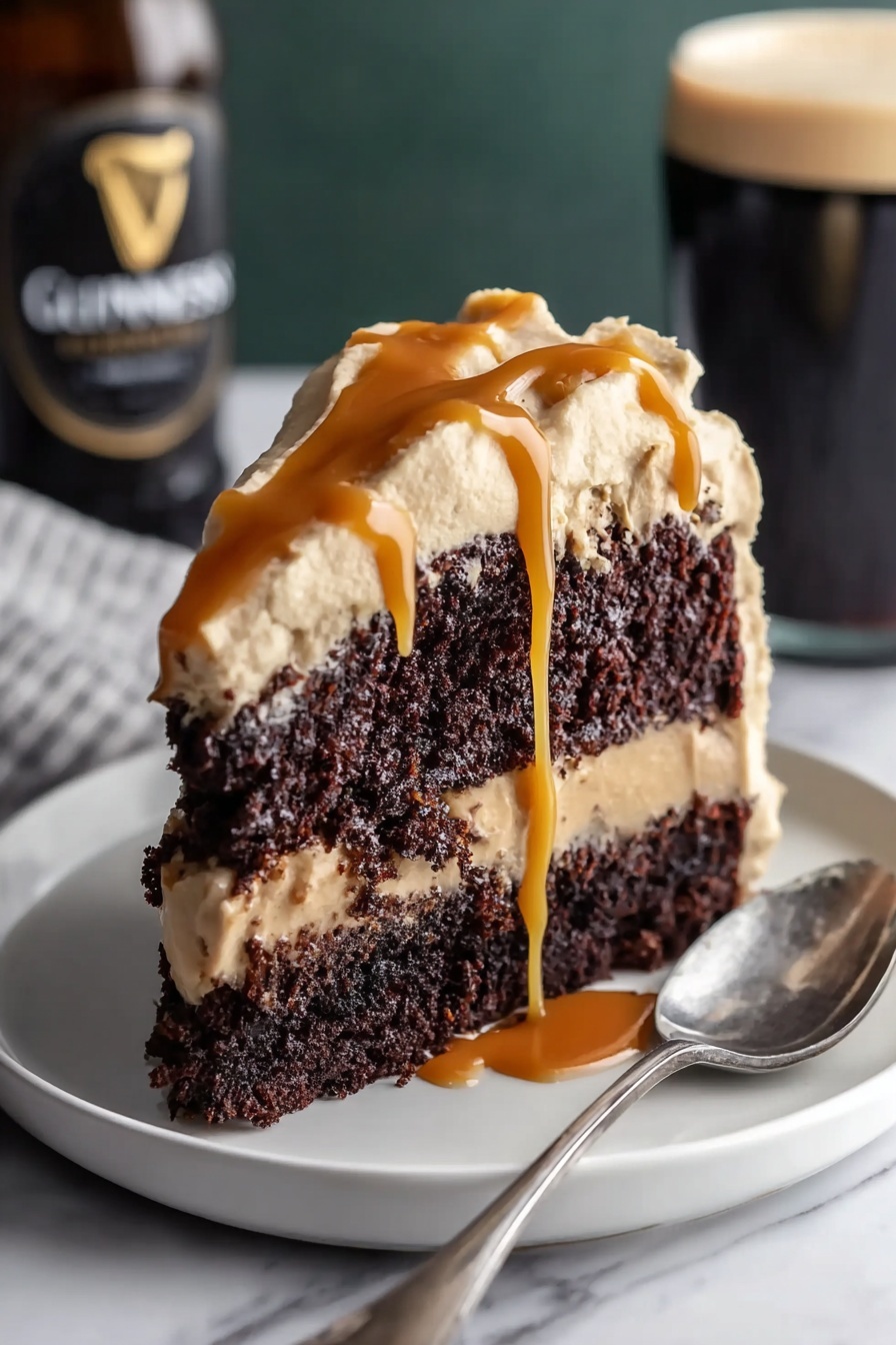 A slice of chocolate cake with caramel drizzle.