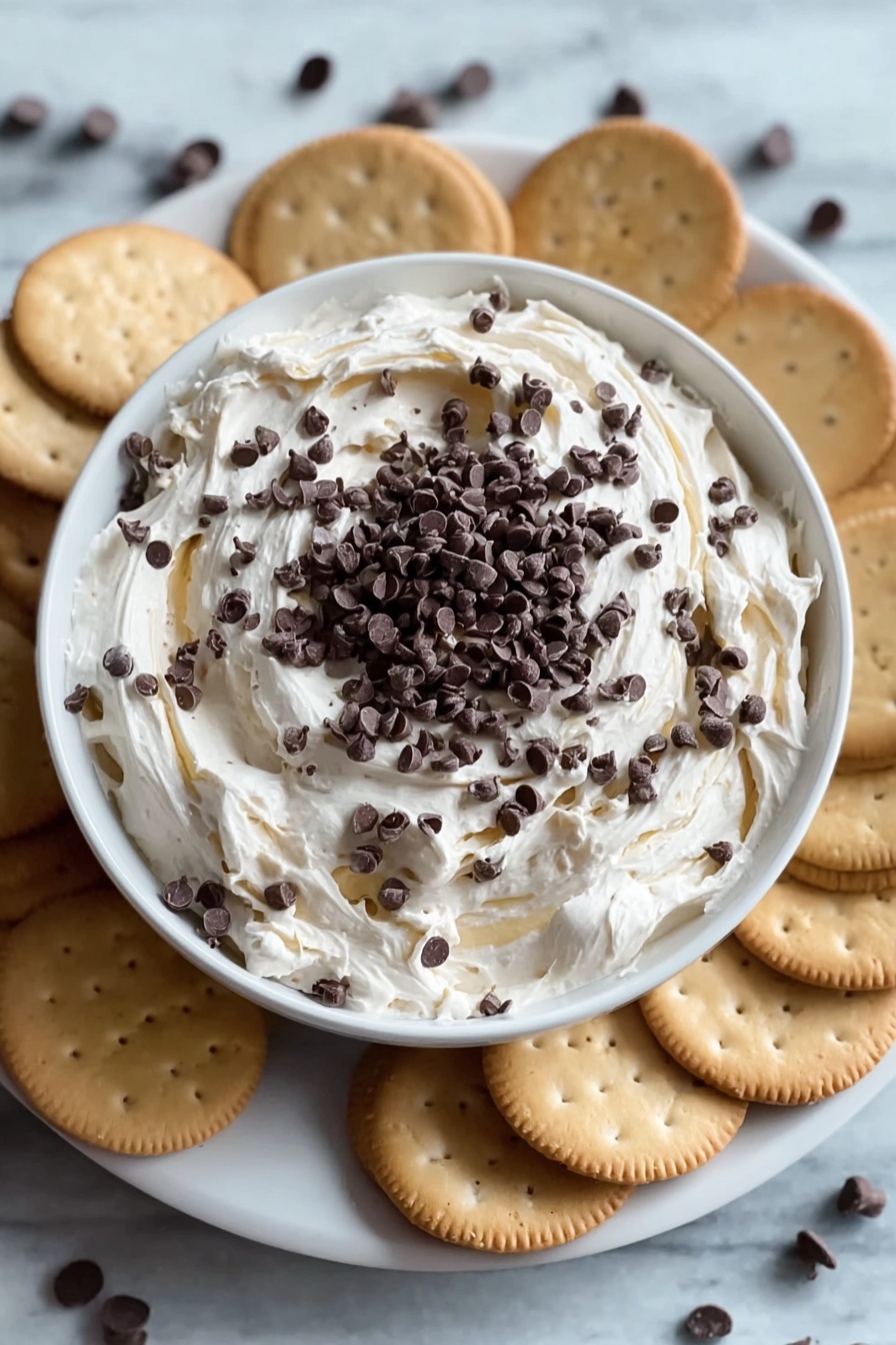 A bowl of chocolate chip cookie dough dip.