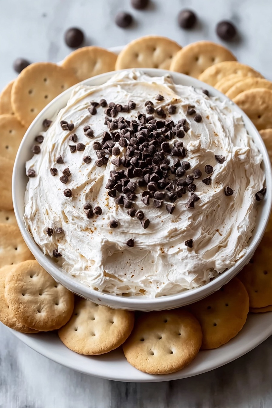 A bowl of chocolate chip cookie dough dip.