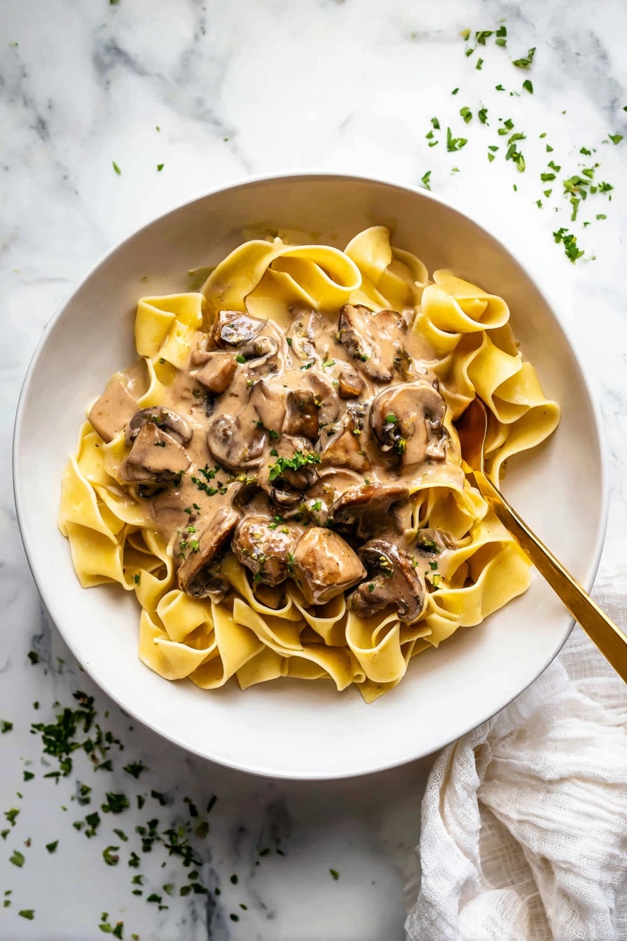 A bowl of chicken stroganoff.