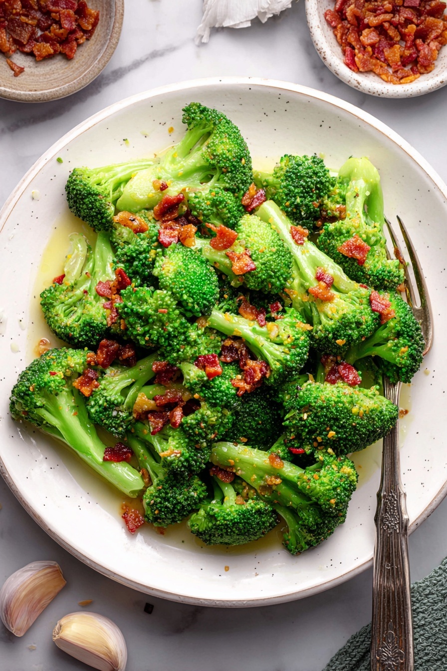 A plate of broccoli with garlic sauce.