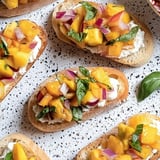 A plate of toast with fruit on top.