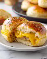 Two breakfast bombs with cheese and herbs.