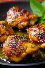 Roasted garlic and herb chicken thighs.
