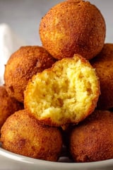 A stack of hush puppies.