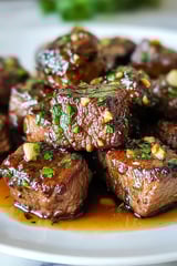 A plate of honey garlic butter steak bites.