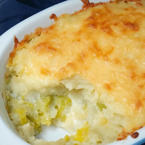 A slice of cheesy casserole.