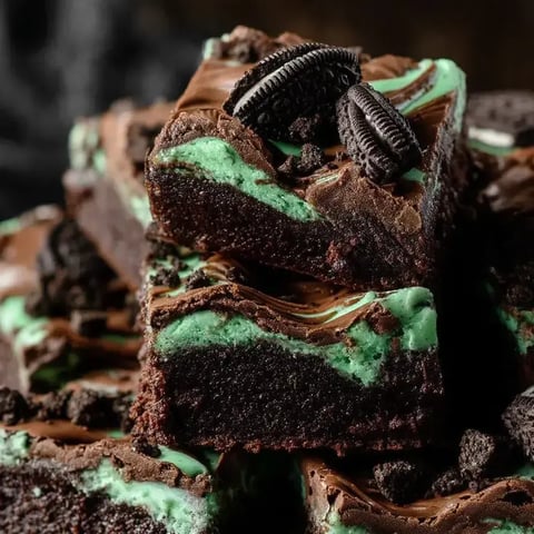 Chocolate cake with Oreo cookies on top.