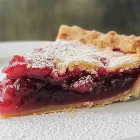 A slice of pie with a white plate.