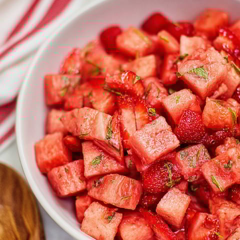 A bowl of sliced watermelon.