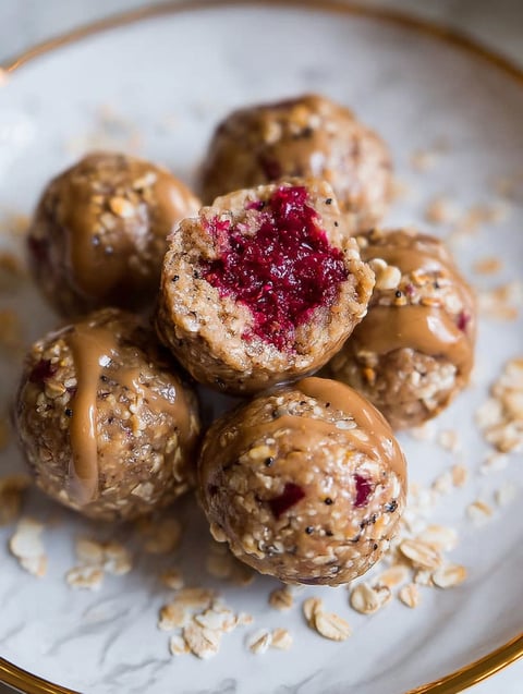 A plate of peanut butter and jelly protein balls.