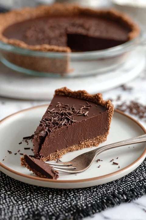 A slice of vegan chocolate pie.