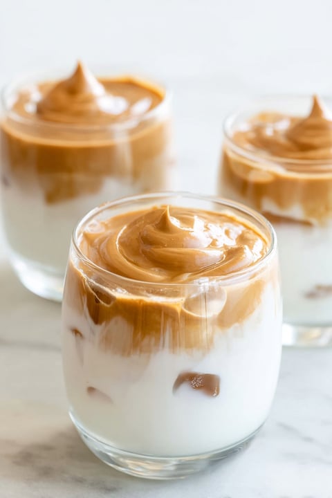 A glass of dalgona coffee.